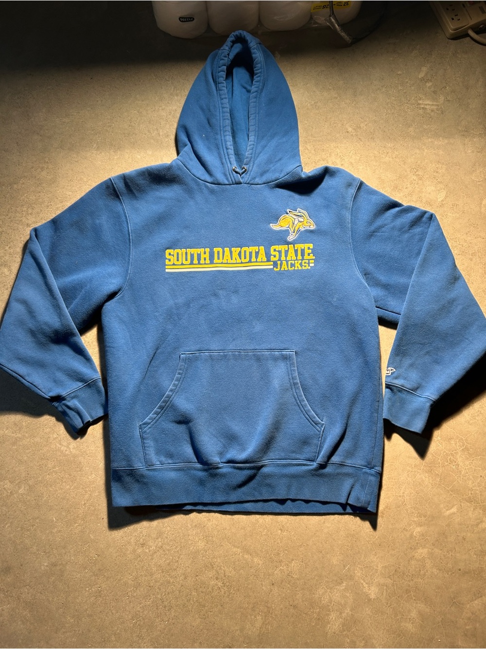 Blue 84 Navy and Yellow Branded Hoodie Tag Detail
